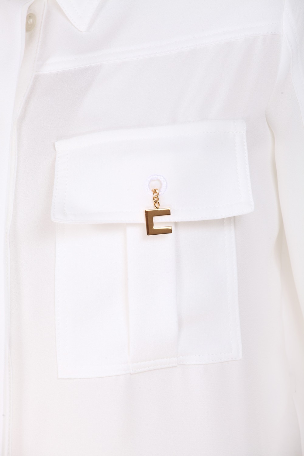 shop ELISABETTA FRANCHI Saldi Camicia: Elisabetta Franchi camicia in georgette con logo charms.
Maniche lunghe aperte sul davanti.
Ampie tasche a soffietto con patta fermata da gemelli con ciondolo logato.
Composizione: 100% poliestere.
Made in Italy.. CA01626E2-360 number 4251165